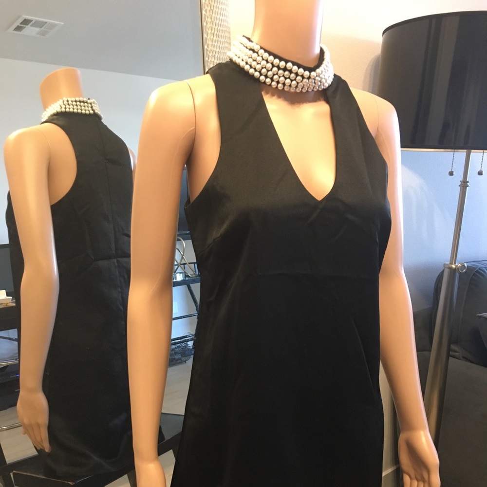 Black dress with faux pearl neck detail